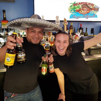 Team at the bar at Acapulco Mexican Restaurant in Tonawanda, New York